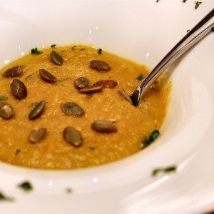 Spiced Squash & Banana Soup topped with Pumpkin Seeds and Walnuts