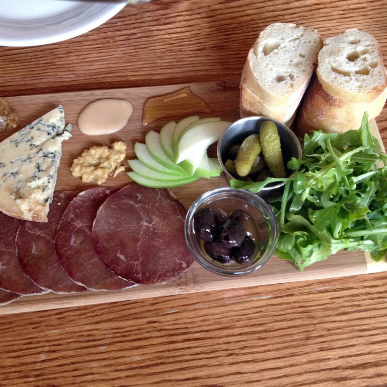 “A Dream Come True” Cheese Board with cheese, charcutrie, gherkins & Spanish almonds and savoury something baked