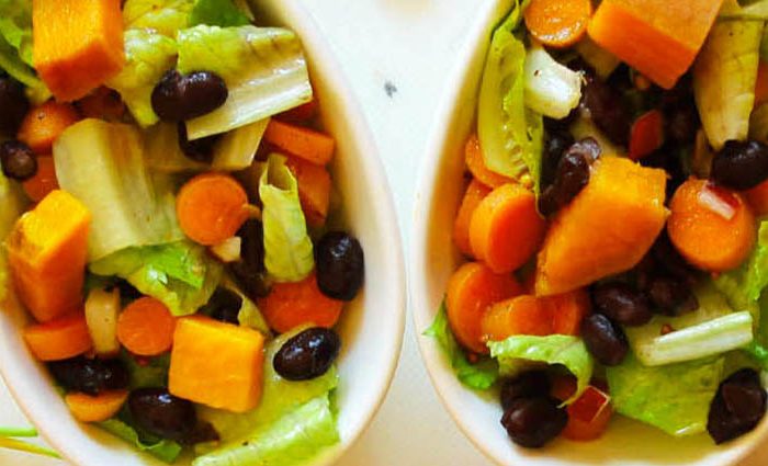Balanced Romaine, Black Bean, Sweet Potato Salad Medley with Chipotle Vinaigrette.